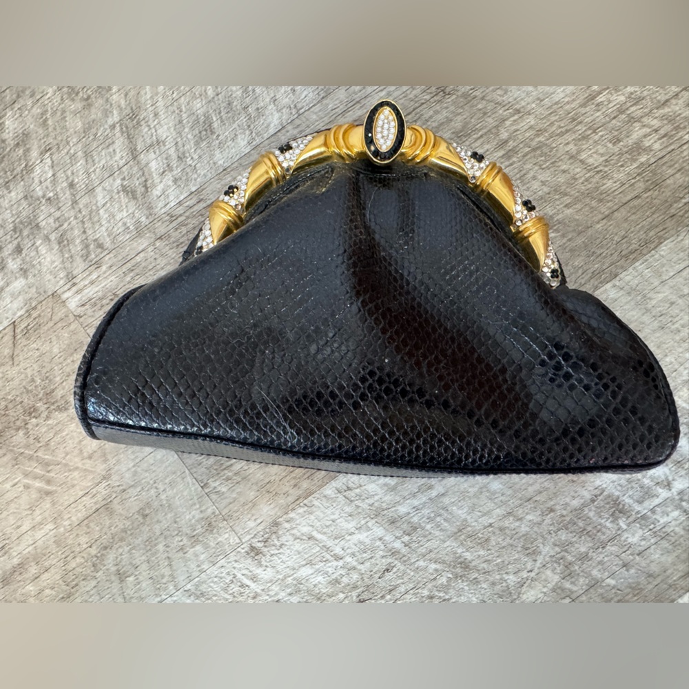 Black clutch bag w gold tone/jewel pattern clasp, gold-tone chain strap